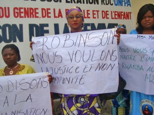 On Saturday, the International Day of Peace, AJWS grantees and other women’s groups in North Kivu gathered to protest ongoing conflict and finalize a joint statement to Mary Robinson. This activist's sign reads, "Mrs. Robsinson, we want justice and not impunity."