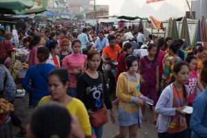 Young women fill the streets near a Cambodian garment factory.