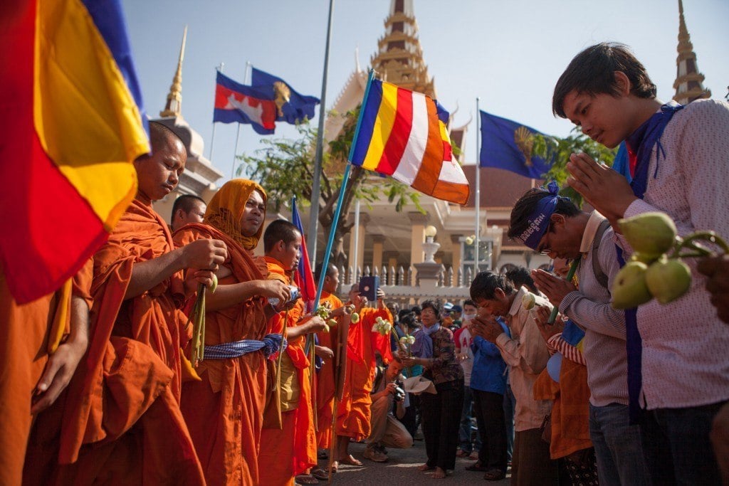 Monks bless the crowd at a human rights demonstration in Phnom Penh.