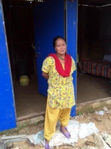 Indra Maya, a widow who survived the earthquake, lost the home that her son had built for her just three months before the disaster. AJWS grantee Himalayan Climate Initiative helped them and 42 other families rebuild.