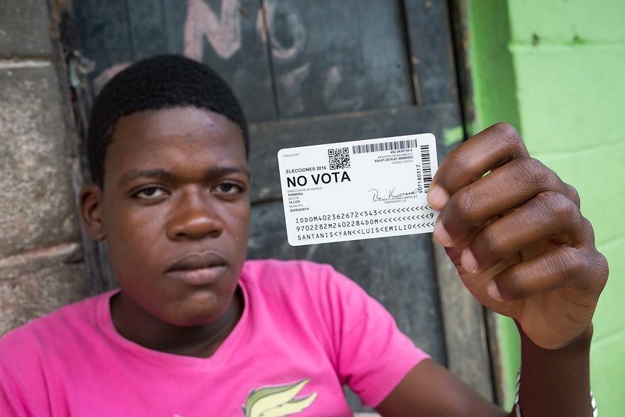 Luis Emilio Santanis Yan, with his ID from the Batey Ulloa, in San Pedro de Macorís, Dominican Republic. He is of Haitian descent and is unable to vote in the Dominican Republic’s upcoming elections. Photo courtesy of Fran Afonso.