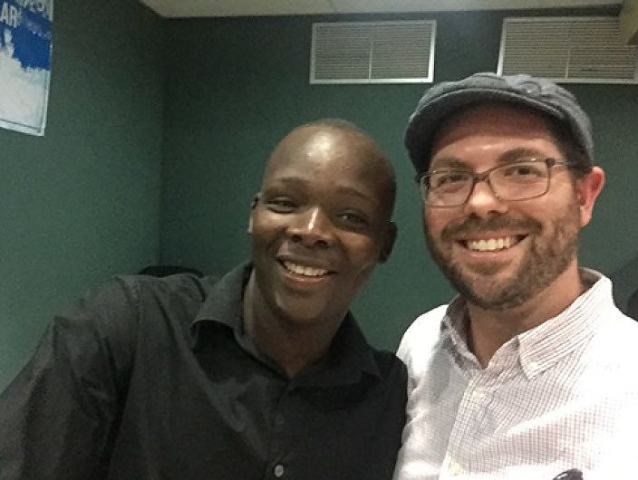 Ignacio, a Dominican of Haitian descent recruited to play Major League baseball (left) and Rabbi Jeff Brown