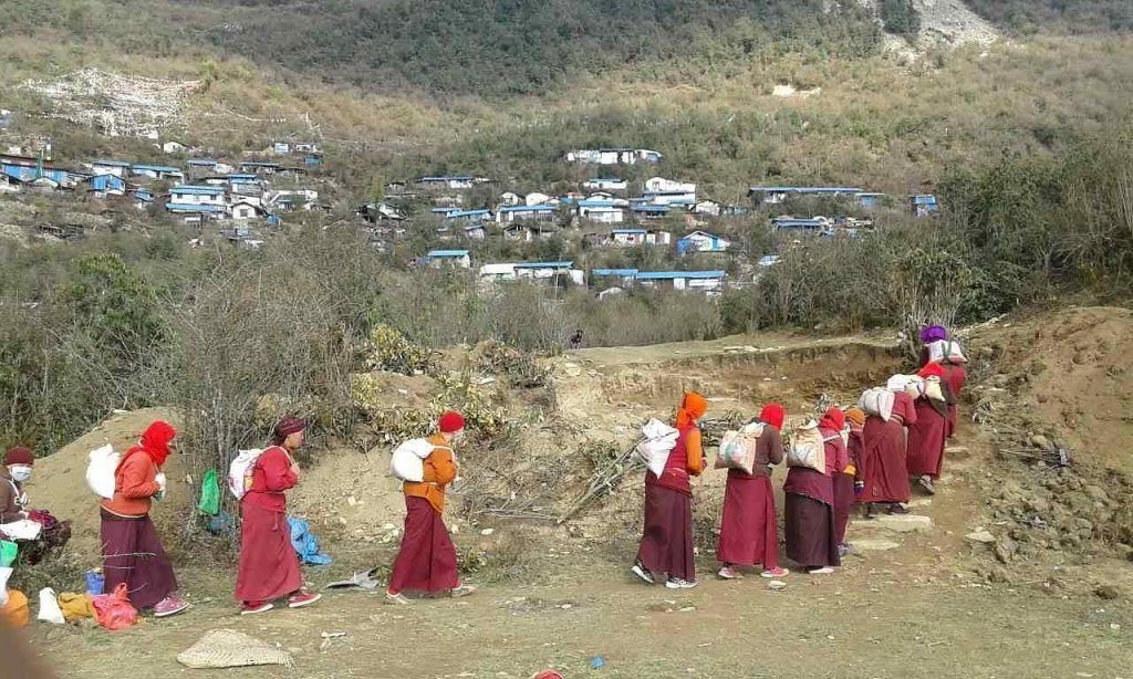 Tibetan refugee Buddhist nuns who lost their homes in the 2015 Nepal earthquake journey back to their remote mountain community to begin the rebuilding process with help from AJWS grantees.