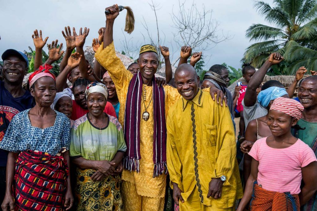 Chief Elder Cheo and his people celebrate their success in preventing EPO from grabbing their land.