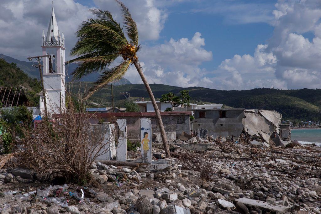 Hurricane Matthew inflicted heavy damage on coastal communities across Haiti. Radyo VKM, which reaches residents of the hard-hit Southern Department pictured here, is helping people rebound. Here, near the sea, buildings lie in rubble and a palm tree, battered by the wind, is severely bent. Photo by Jonathan Torgovnik 