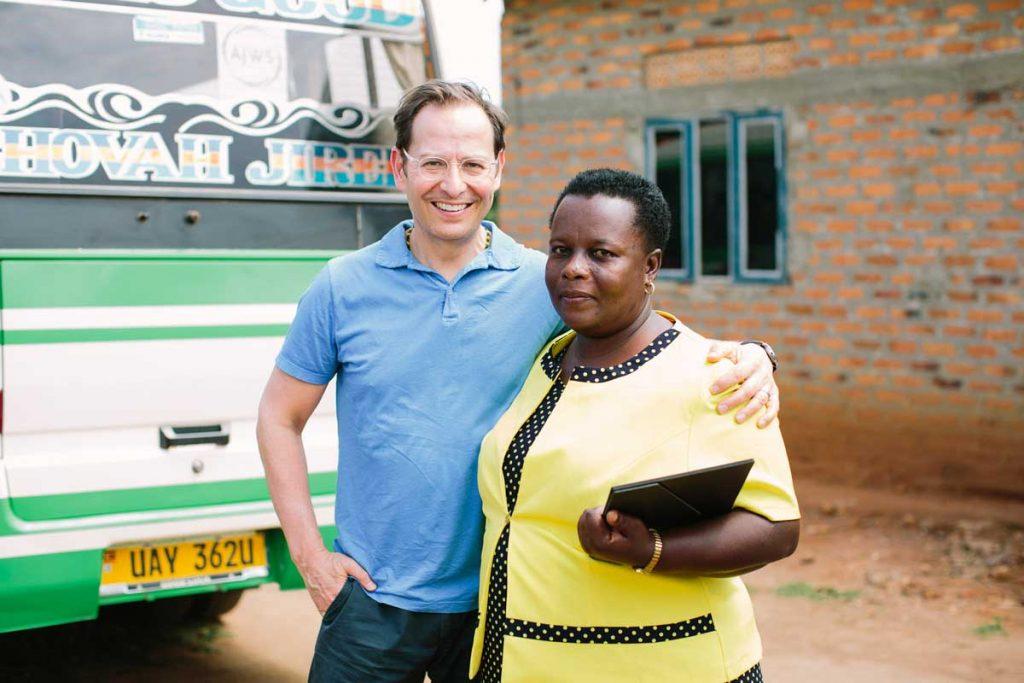 Here I am standing with Beatrice Rukanyanga, Coordinator of Kwataniza Women Farmers Group, whom I visited earlier this year to learn more about KWG’s efforts to support women's land rights in rural Uganda. Photo by Christine Han