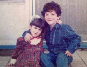 Malka Friedman-Rosner and her brother Akiva in front of their home. Photo courtesy of Malka Friedman-Rosner