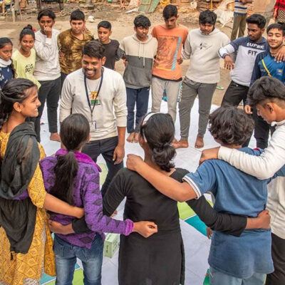 group of people together in a circle