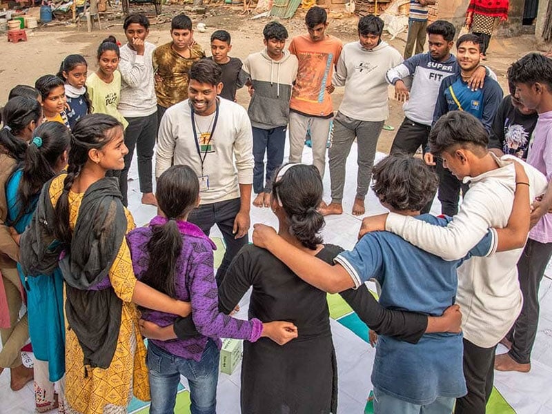 group of people together in a circle