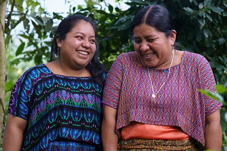 mother and daughter smiling together