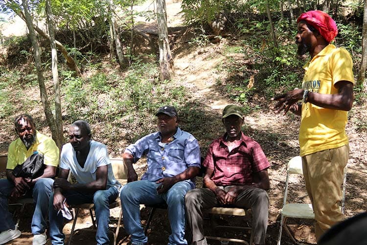 group of people sitting outside