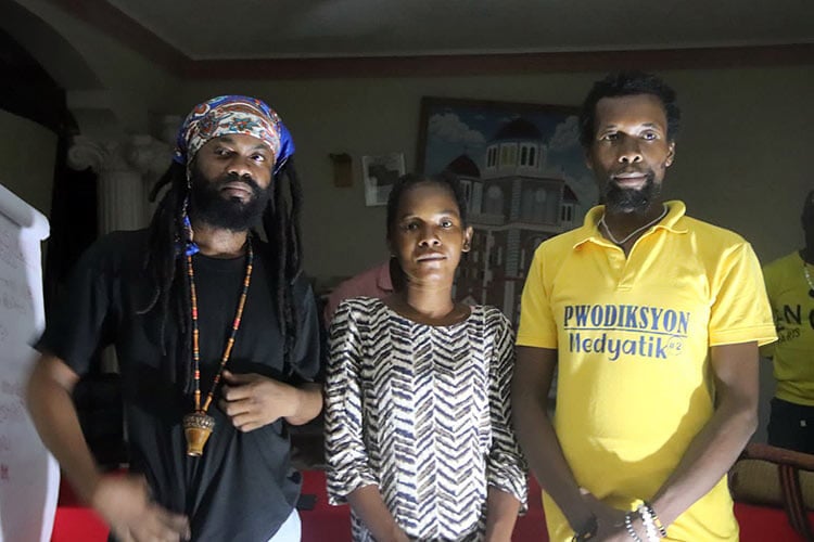 three people standing together