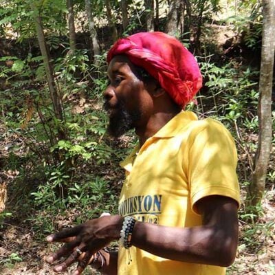 man in yellow tshirt outside