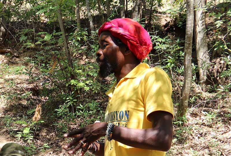 man in yellow tshirt outside