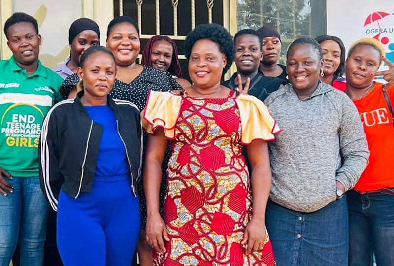 group of people smiling together outside