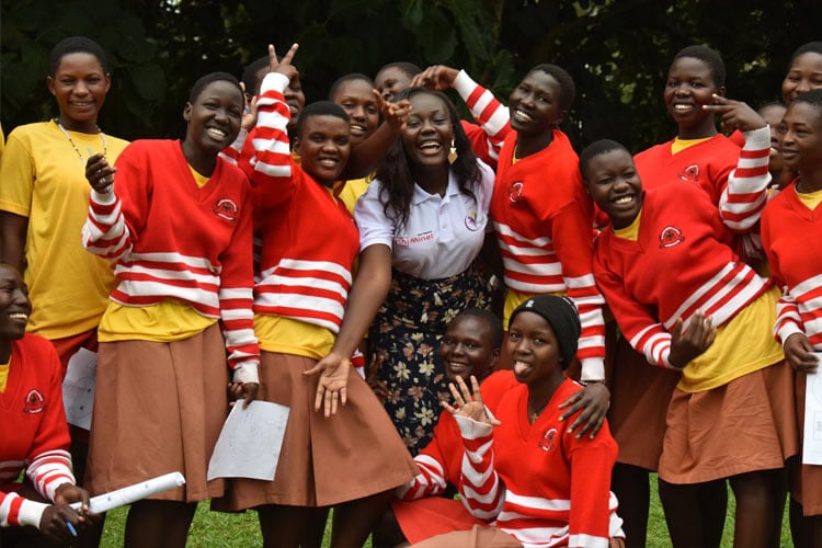 group of girls smiling outside together