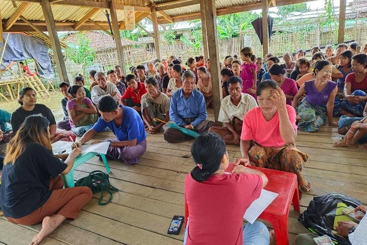 a few dozen people gathered for a workshop