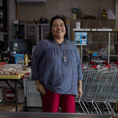 woman standing and smiling at camera