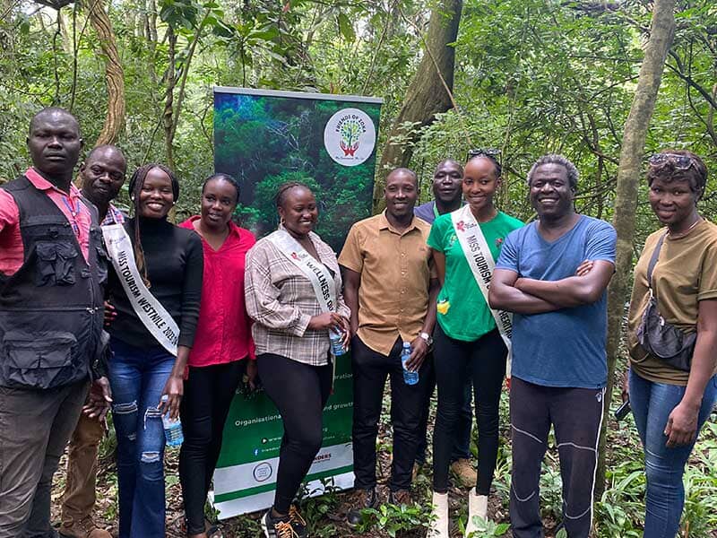 group of people posing outside