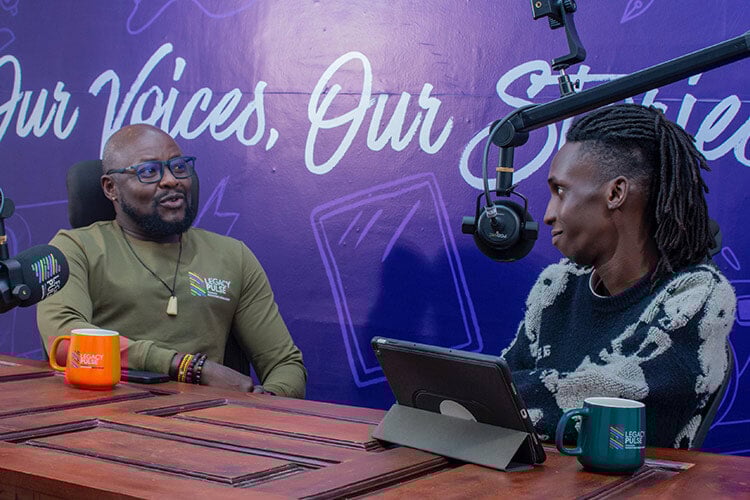 two people speaking on the radio